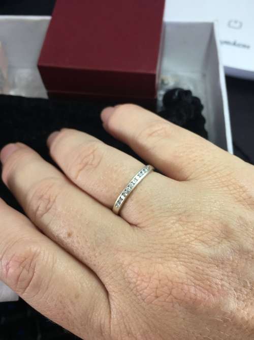 9CT WHITE GOLD AND DIAMOND ETERNITY RING